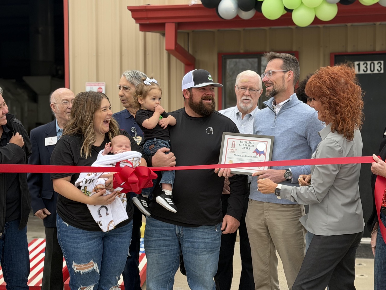 Chamber ribbon cutting celebrating a new Ardmore business